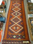 Suzni Kelim carpet runner, autumnal tones with repeating diamond central block with triple border,