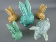 Three Sylvac rabbits and one other and a pig ornament with similar matt finish