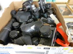 Box of many vintage cameras including Zenit-E, Petri 7S, Pentax and many others