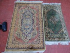 Two small rugs, the larger 150 x 90 cms, the smaller 120 x 60 cms