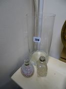 Mdina paperweight, small silver banded oil bottle and a plain glass chimney vase