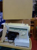 Cased Singer electric sewing machine E/T