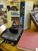 Boxed CB mobile transmitter and a radio and television servicing manual