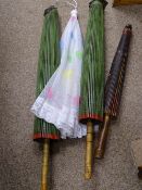 Three vintage bamboo parasols etc