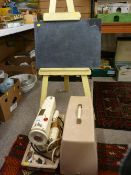 Vintage cased Singer sewing machine and a vintage easel with slate board