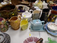 Jugs, planters and teapots by Sylvac, Burleighware, Kensington with a Majolica planter and a jug