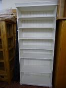 Tall white multi-shelf Ikea style bookcase
