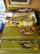 Boxed digital radio control BMW M1, two unchecked Meccano combat construction sets and a boxed