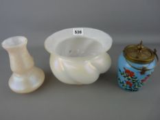 Pearl iridescent glass bowl and vase and a blue glass jar with brass mount and cover, the body