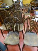 Parcel of wheelback dining chairs including two carvers