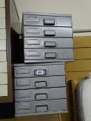 Pair of small four drawer filing cabinets and a black strong box