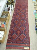 Meshwani carpet runner, red and blue ground with repeating diamond central pattern and single