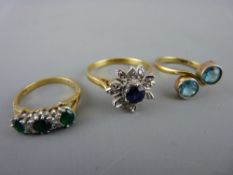 Three eighteen carat gold lady's dress rings set with precious and semi-precious stones