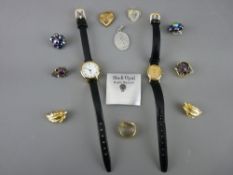 Two lady's Quartz wristwatches and a small parcel of clip earrings etc