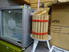 Husky tabletop fridge with Stella Artois label and an Apex fruit press E/T