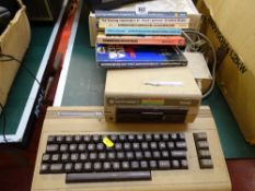 Commodore 64 with accompanying books etc