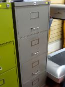 Grey metal four drawer filing cabinet