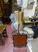Wrought iron and copper Arts & Crafts style firescreen and a brass standard lamp A/F