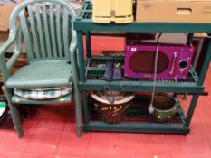 Pair of green garden chairs and a small three shelf plastic storage rack