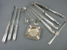 Group of EP lobster picks and crackers, stamped 'The Mosley Hotel Ltd', a hallmarked silver