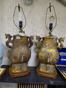 Pair of large gilt pottery twin handled Oriental table lamps