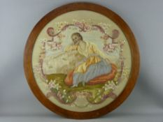 A CIRCULAR SILKWORK EMBROIDERED PICTURE, early 20th Century of a young girl with painted facial