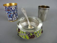 TWO RUSSIAN VODKA SHOT CUPS and a three footed white metal salt with champleve decoration and spoon,