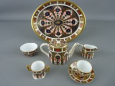 A ROYAL CROWN DERBY MINIATURE CABARET SET WITH TRAY and a two handled mug, '1128' pattern, all first