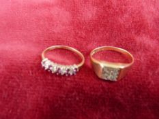 A NINE CARAT GOLD RUBY & DIAMOND DRESS RING with ten rubies & eight diamonds, size L/M, together