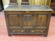 AN ANTIQUE OAK MULE CHEST, peg joined construction with interior candle box and secret drawer,