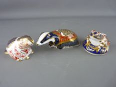 THREE ROYAL CROWN DERBY PAPERWEIGHTS, 'Moonlight Badger', gold stopper, 'Beaver', silver stopper and