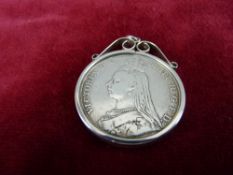 AN 1892 VICTORIA GEORGE & DRAGON SILVER CROWN in pendant mount, 35.8 grms, Jubilee head
