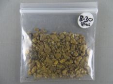 CLOGAU GOLD a parcel of flakes and chip, 8.3 grms