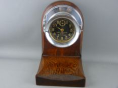 A SETH THOMAS MkI US NAVY BOAT CLOCK numbered 1530, dated 1940, in an oak mounted hinged chrome