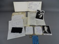 THE BEATLES - a small autograph album and loose quantity of signatures including verified Paul