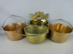 THREE ANTIQUE BRASS PRESERVE PANS with iron swing handles and a pierced and shaped brass, possibly
