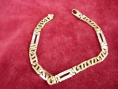A NINE CARAT GOLD WHITE & YELLOW BRACELET of oblong links, 20 grms