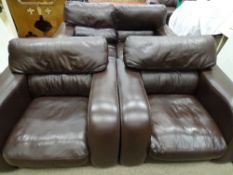 A MODERN BROWN LEATHER EFFECT THREE PIECE SUITE of two seater settee and pair of matching armchairs,
