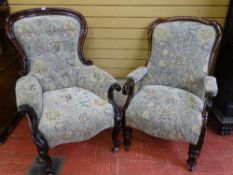 A VICTORIAN BUTTON UPHOLSTERED SPOONBACK ARMCHAIR and one other in matching upholstery, 106 cms