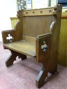 A NEATLY PROPORTIONED VICTORIAN OAK CHURCH/CHAPEL PEW having slight Gothic detail, 105 cms high,
