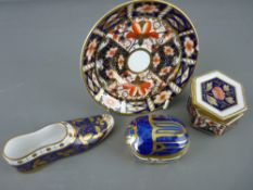 THREE PIECES OF ROYAL CROWN DERBY and a Spode china shoe including a 'Millennium Bug' paperweight,