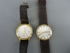 A JAEGER LE COULTRE EIGHTEEN CARAT GOLD CASED GENT'S WRISTWATCH and a Helvetia nine carat gold cased