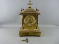 A 19th CENTURY FRENCH LACQUERED BRASS MANTEL CLOCK having gilt pierced dial detail and Arabic