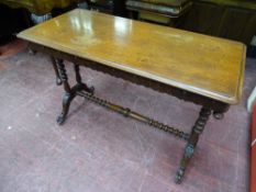 A VICTORIAN MAHOGANY SIDE TABLE with upturned corner finials, bobbin supports and cross stretcher on