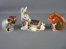 THREE ROYAL CROWN DERBY PAPERWEIGHTS, 'Derby Ram', 'Squirrel' numeral marked LXI and 'Recumbent