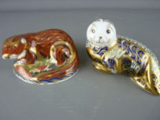 TWO ROYAL CROWN DERBY PAPERWEIGHTS, 'Harbour Seal' no. 1788/4500 and 'Otter', both with gold