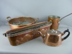 FOUR ANTIQUE COPPER KITCHEN ITEMS including a French fish poacher with iron swing handle, embossed