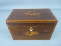 A VICTORIAN MAHOGANY TEA CADDY with Sheraton type shell inlay and boxwood stringing, the interior