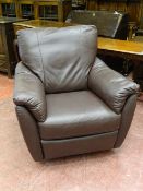 A MODERN SOFT FEEL BROWN LEATHER EFFECT MANUAL RECLINER ARMCHAIR on a swivel and rocking base, 97