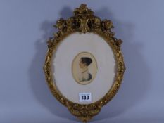 A SMALL PROFILE HEAD & SHOULDERS PORTRAIT STUDY OF A LADY in a gilt gesso frame, 8 x 6 cms, 29.5 x